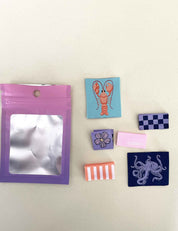 Spring Tides Label Pack | 6 Geweven Labels met Octopus, Kreeft & Meer
