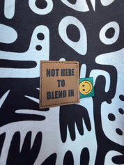 Not Here to Blend In | Kunstleren label